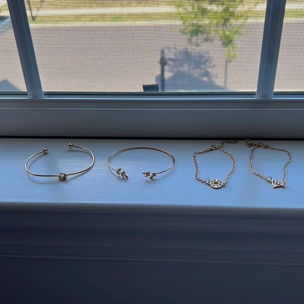 4 bracelets, gold color